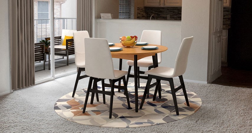 a dining room with a wooden table and white chairs