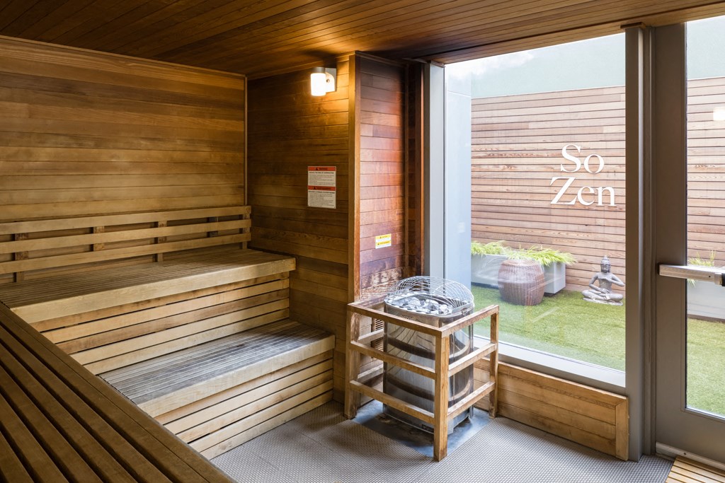 a sauna in a wooden building with a window