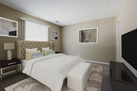 a bedroom with a bed and a television