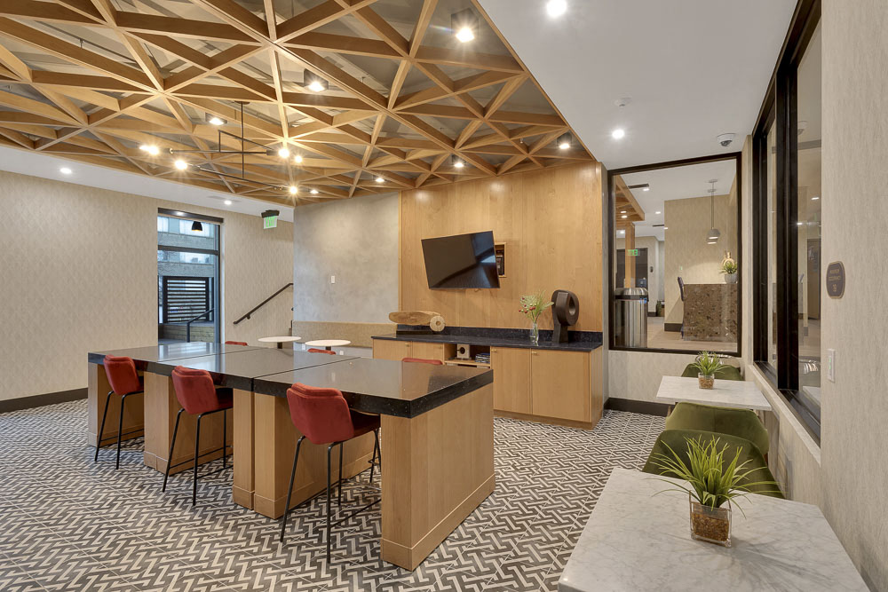 a conference room with a table and chairs