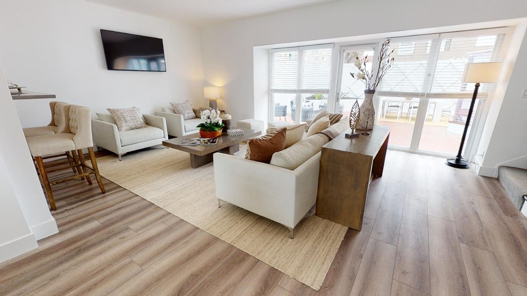 a living room with a couch and a table
