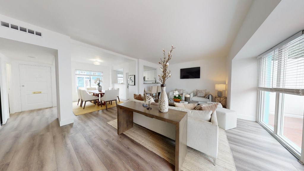 a living room with a couch and a table