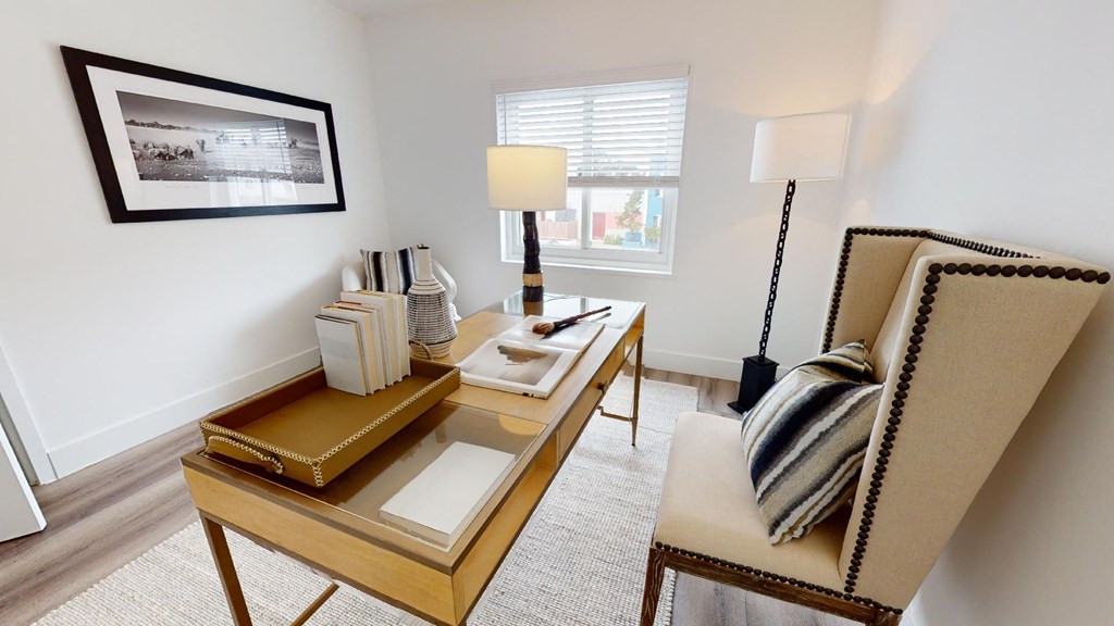 a living room with a couch and a table