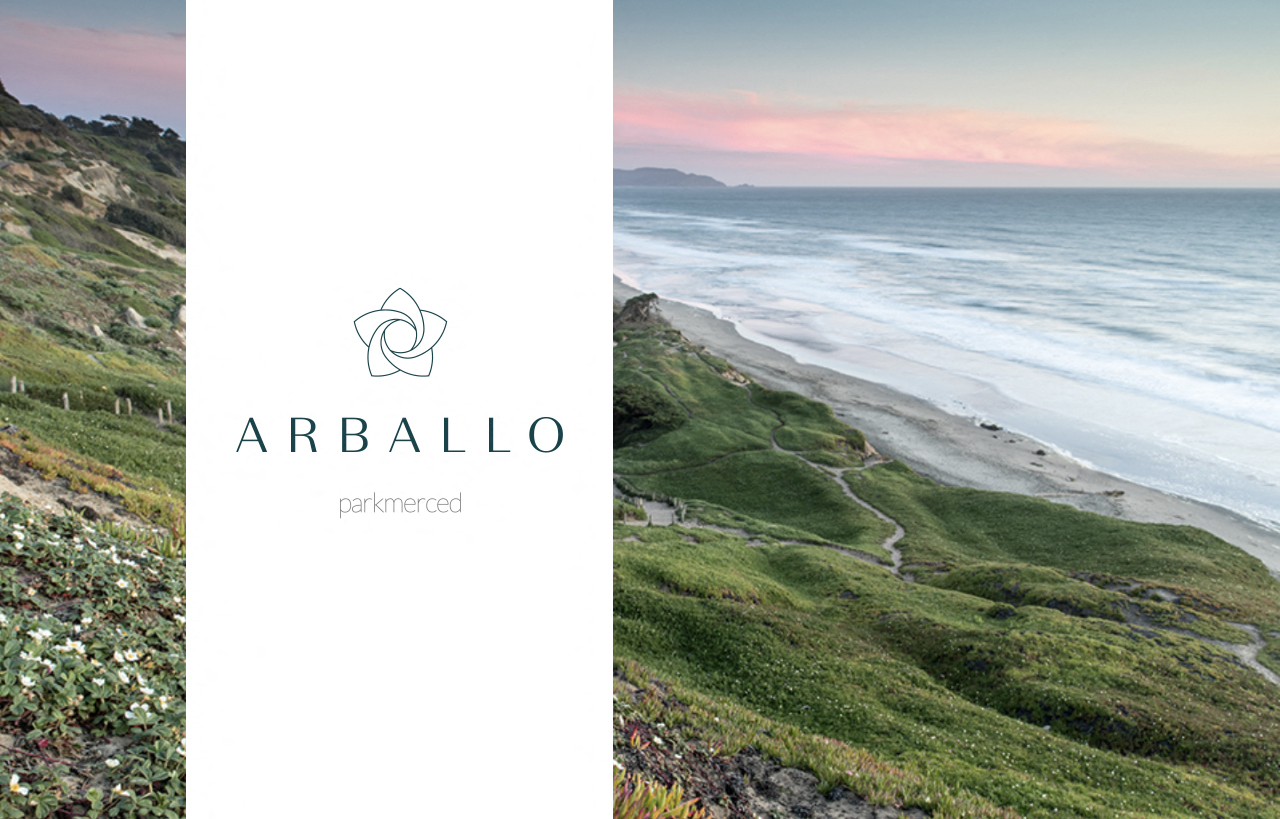 a view of the ocean and a beach with a logo