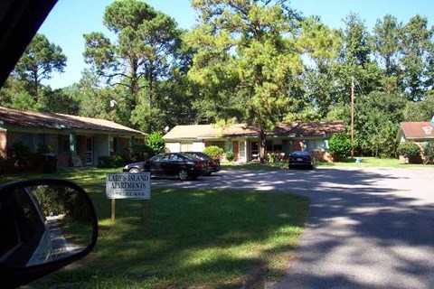 a car is parked in front of a house