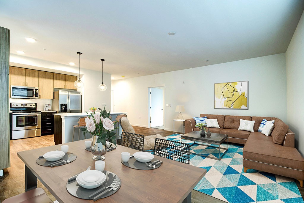 a living room with a couch and a table