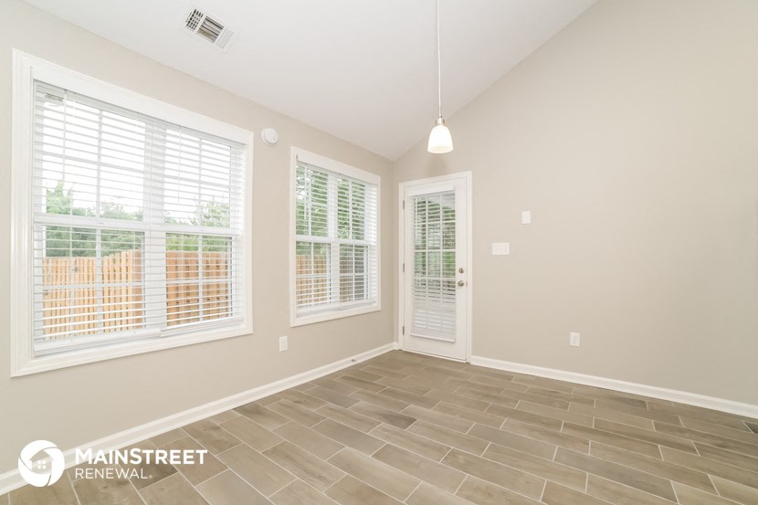 the living room is clean and ready to use