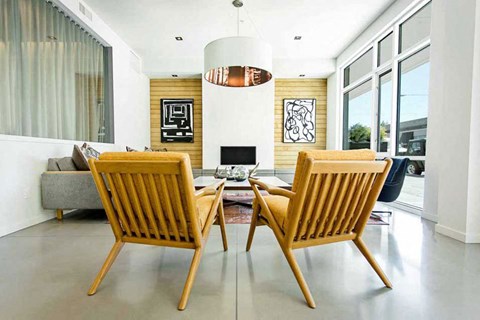 Two chairs facing each other in a room.