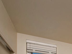 Bedroom with windows at Infinity Apartments in Seattle WA - Photo Gallery
