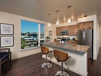 Kitchen island seating at Infinity Apartments in Seattle WA