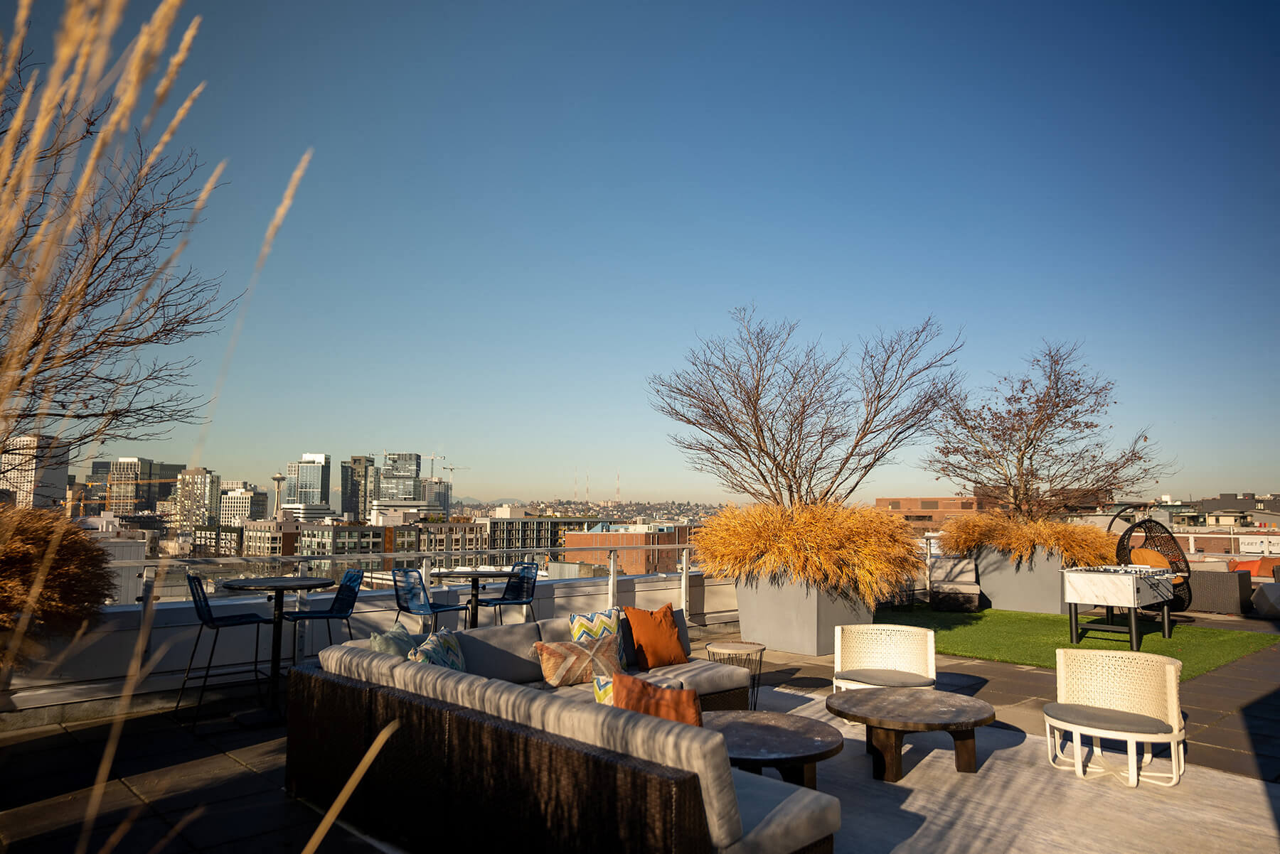 Rooftop deck with seating at Infinity Apartments in Seattle WA