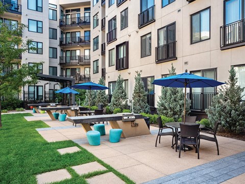 Exterior BBQ area at The Douglas Apartments in Denver