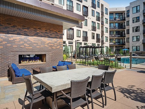 Poolside Fireplace Lounge at The Douglas Apartments in Denver