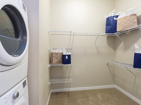 Laundry Room with Washer and Dryer at The Douglas Apartments in Denver