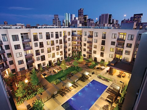 Aerial view of the pool and building at The Douglas Apartments in Denver