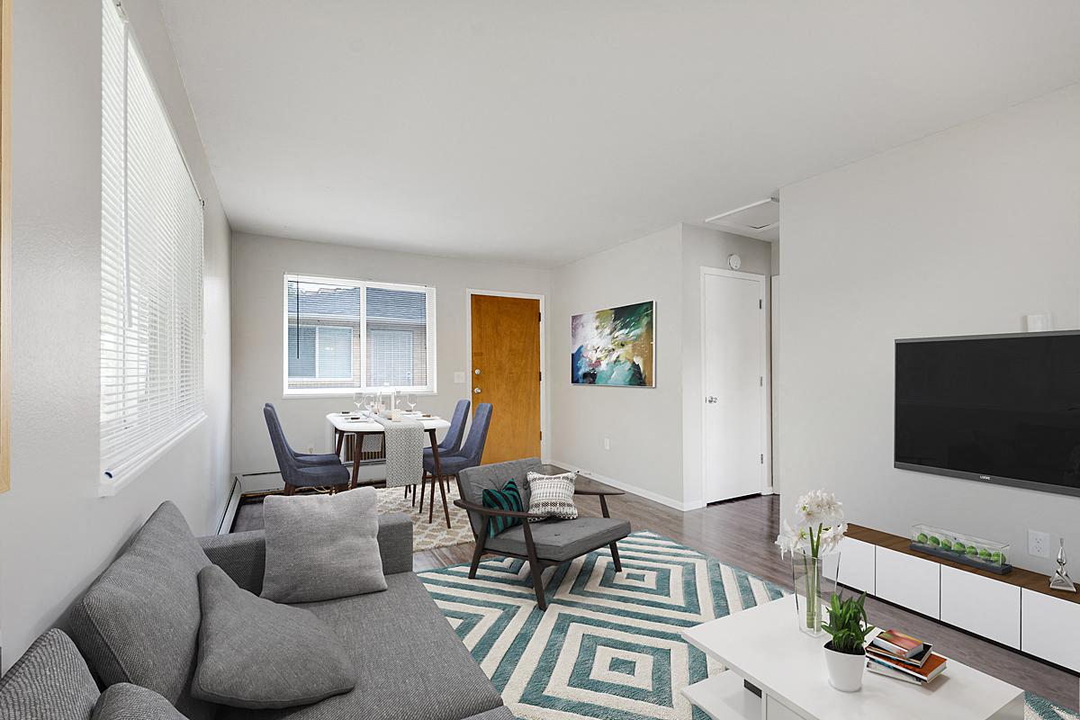 a living room with a couch and a television