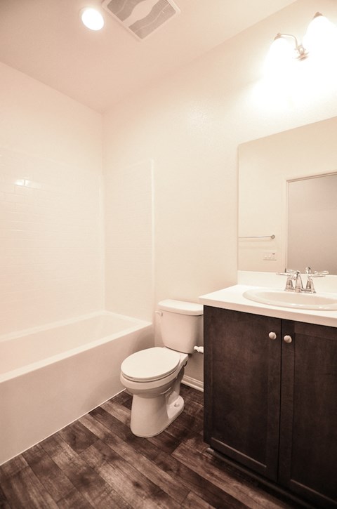 a bathroom with a toilet and a sink