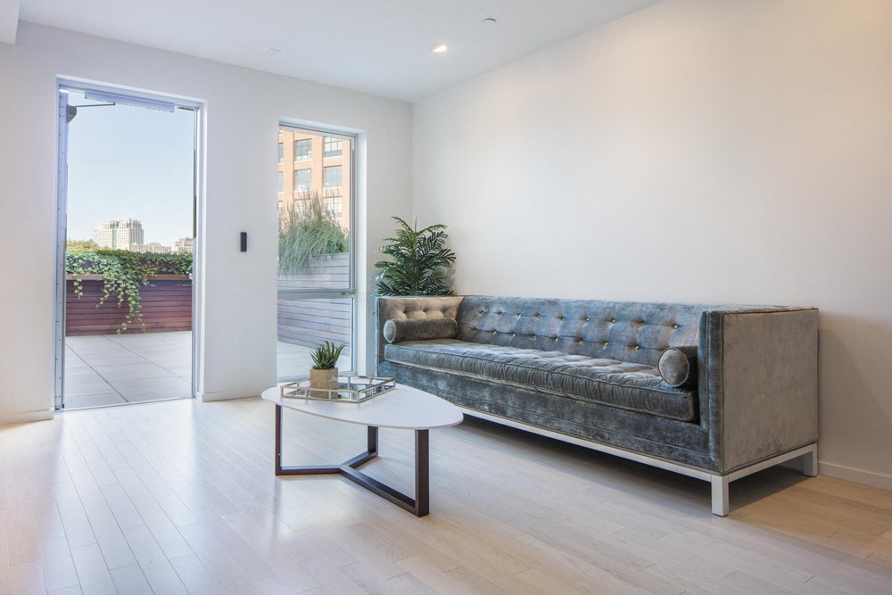 a living room with a couch and a coffee table