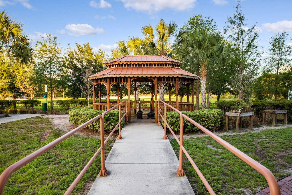 walkway with railings to gazebo in courtyard