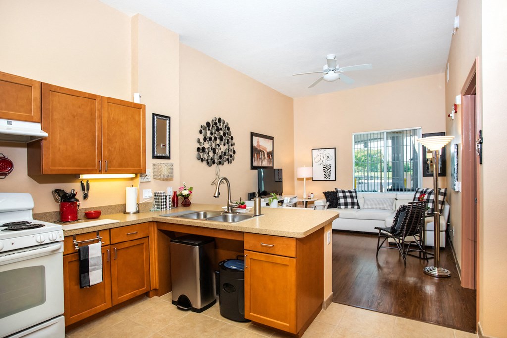 kitchen with white appliances and wood cabientry