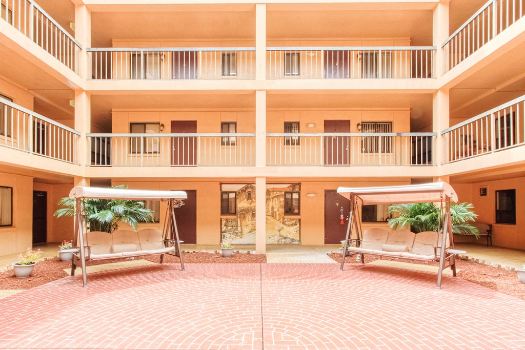 Courtyard Patio with swings and plants at Casa San Pablo