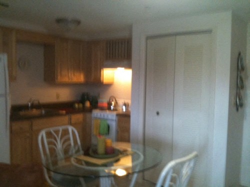 kitchen and dining area in apartment at Casa Santa Marta II Senior Apartments in Sarasota, FL