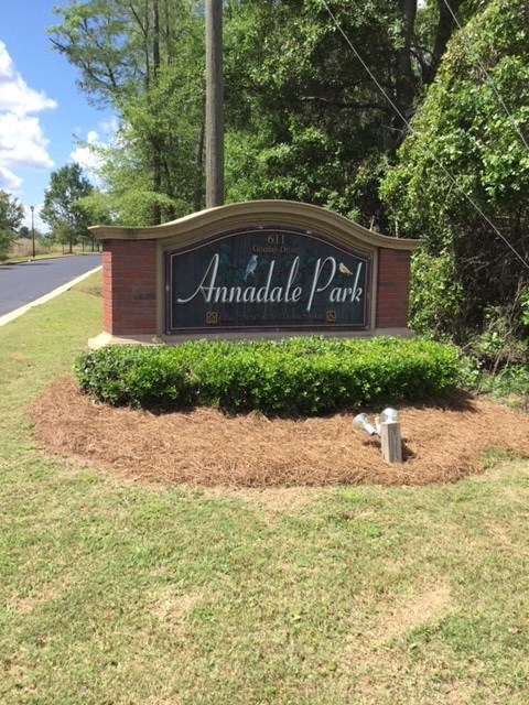 a sign on the side of a road