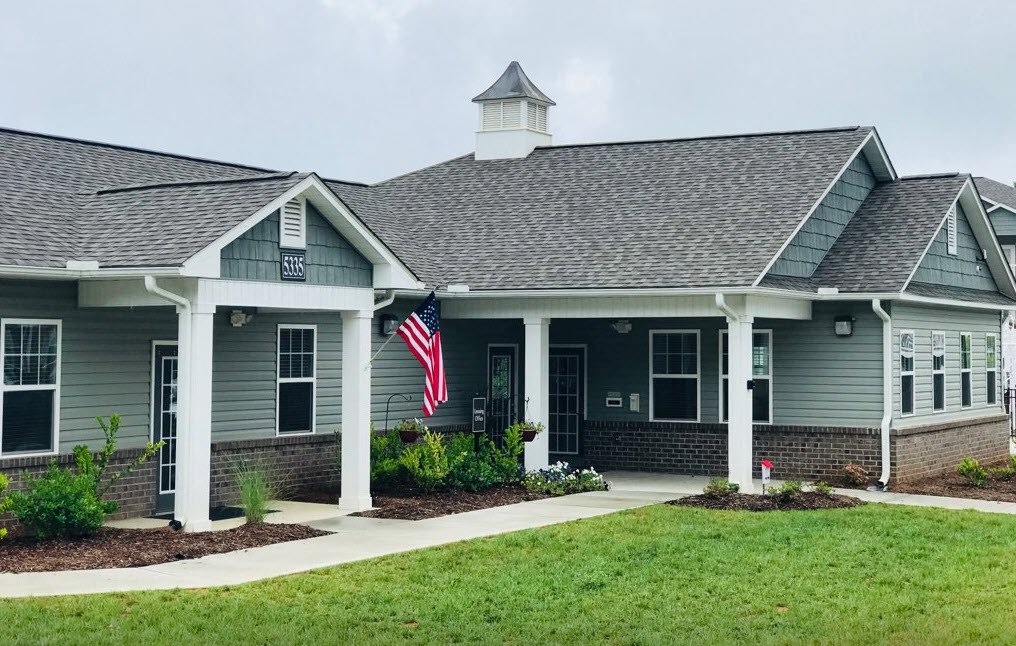 a house with an flag in front of it