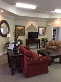 a living room with a couch and a table