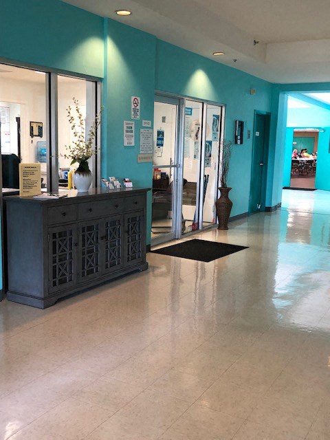 lobby and reception desk at Deedco Gardens in Homestead, FL