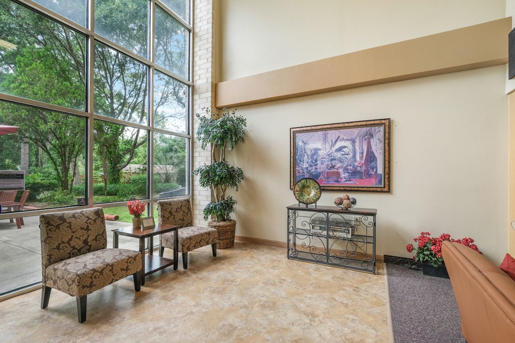 massive windows in lobby seating area of Sundale Manor Senior Apartments in Jacksonville, FL