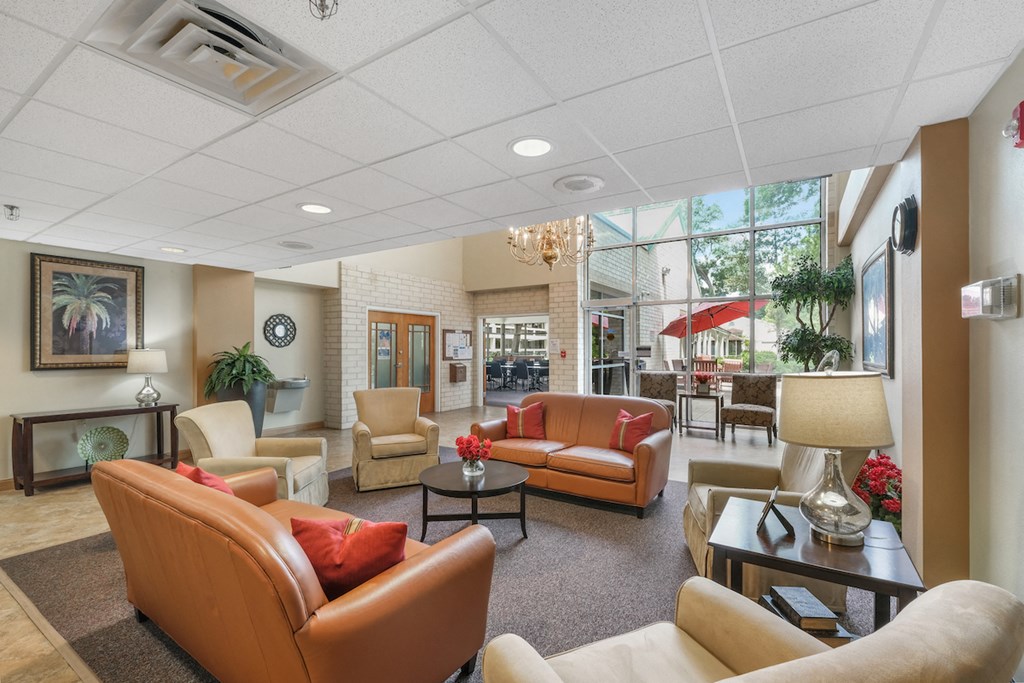 lobby of Sundale Manor Senior Apartments with lots of plush furniture for sitting