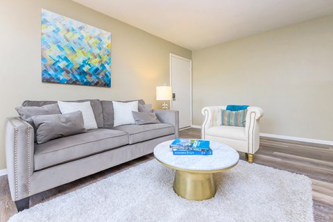a living room with a couch and a coffee table