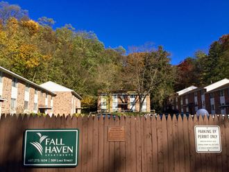 a fence with a sign that reads fall haven on it