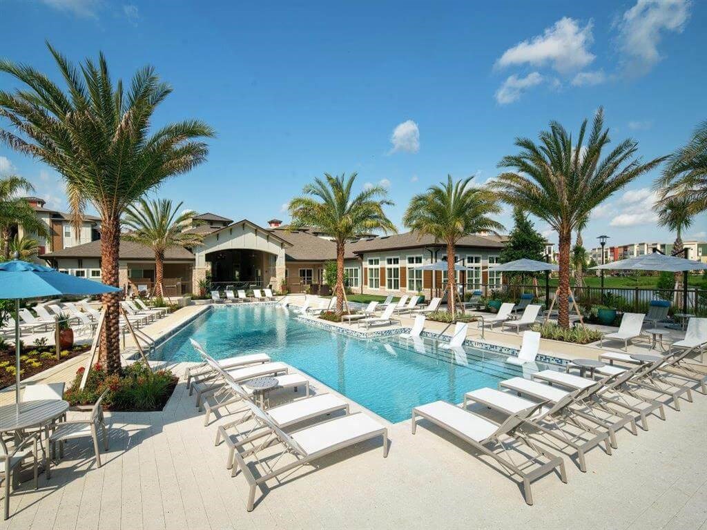 Resort style pool and lounge chairs