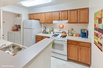 Spacious Kitchen with Pantry Cabinet at The Residences at the Manor Apartments, Frederick