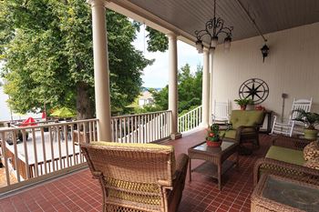 Veranda with Wi-Fi and Rocking Chairs at The Residences at the Manor Apartments, Maryland, 21702