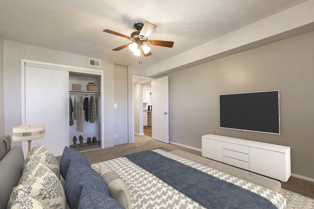 a living room with a couch and a tv