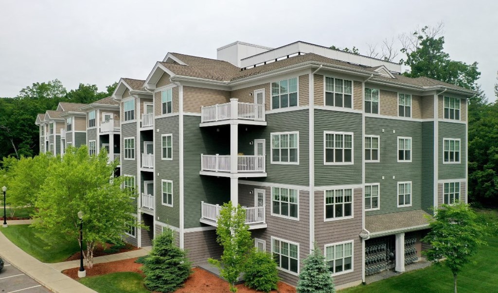an aerial view of a large apartment building with balconies
