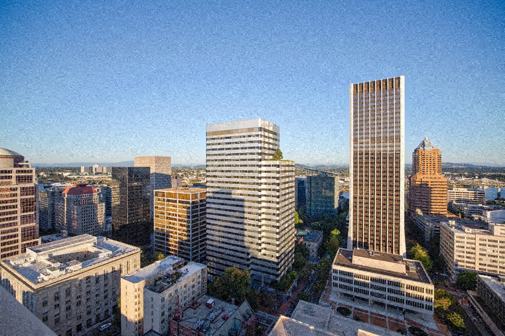 an aerial view of a city with tall buildings