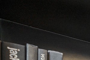a collection of books on a bookshelf