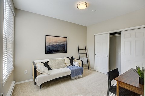 a living room with a couch and a table