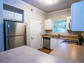 Spacious Full Model Kitchen with Crown Molding at Suisun Apartments for Rent
