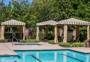 Heated Swimming Pool and Hot Tub Spa with Cabanas at Fairfield Apartments for Rent Near Travis AFB