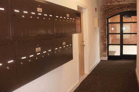 a row of lockers in a hallway of a building