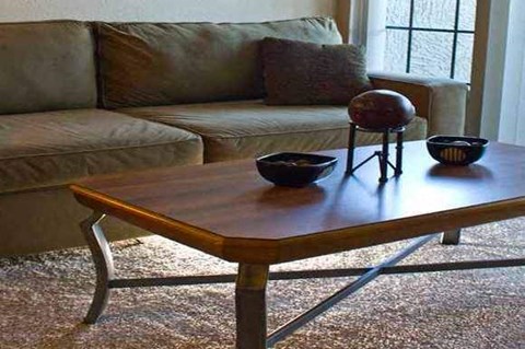 a living room with a coffee table and a couch