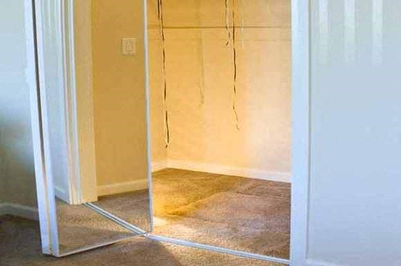 a mirror on the floor in a room