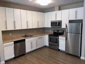 a kitchen at the acadia park apartments in houma, la