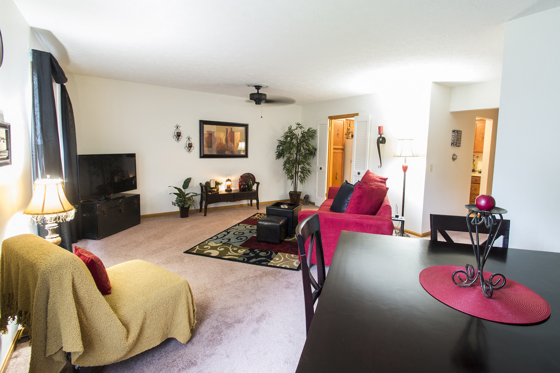 a living room with a couch and a table