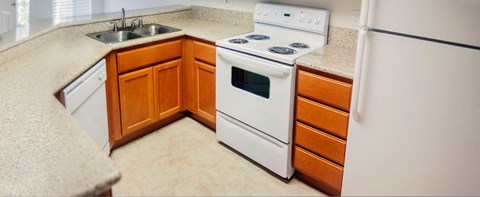 a kitchen with a stove and a sink